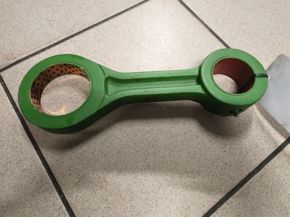 Korbowód przyczepy samozbierającej Krone