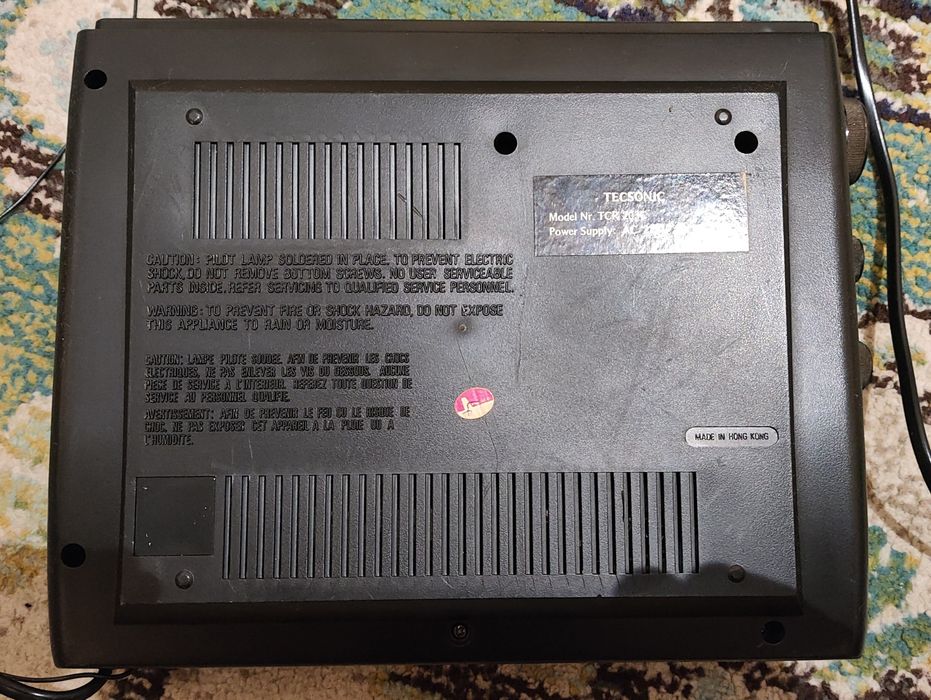 Radio despertador com leitor de cassete