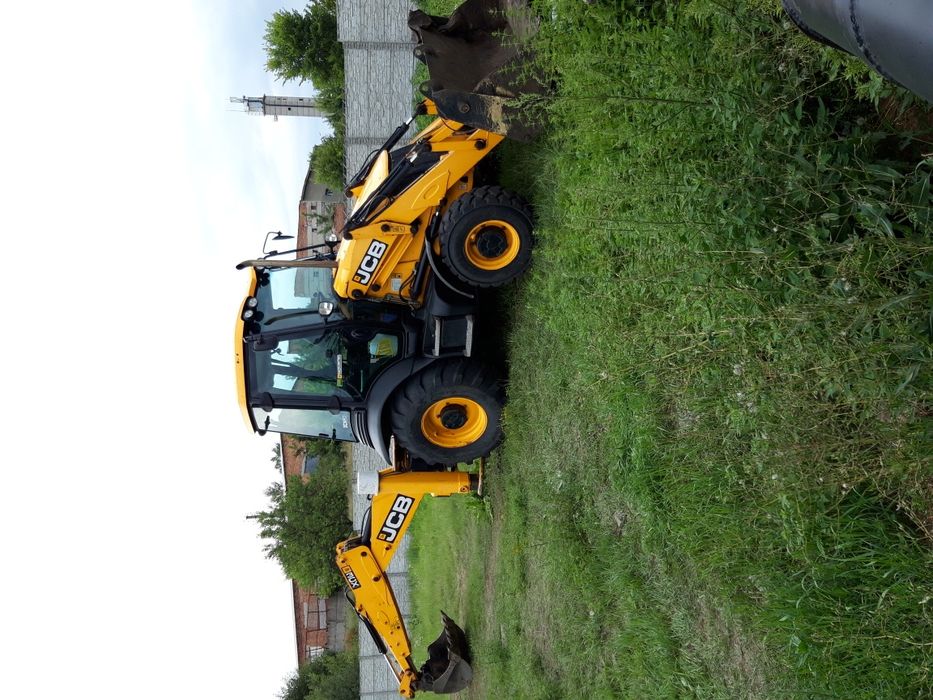 Услуги трактора JCB.