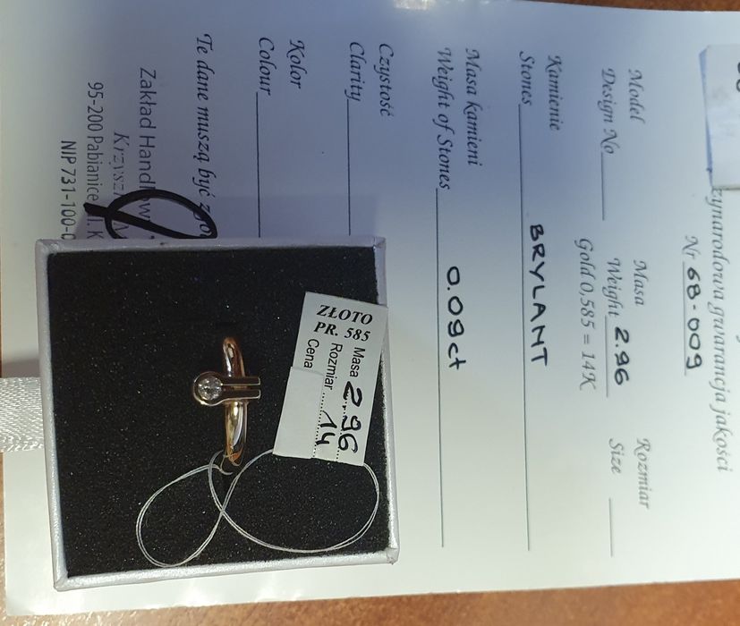Złoty pierścionek z brylantem 14 karat