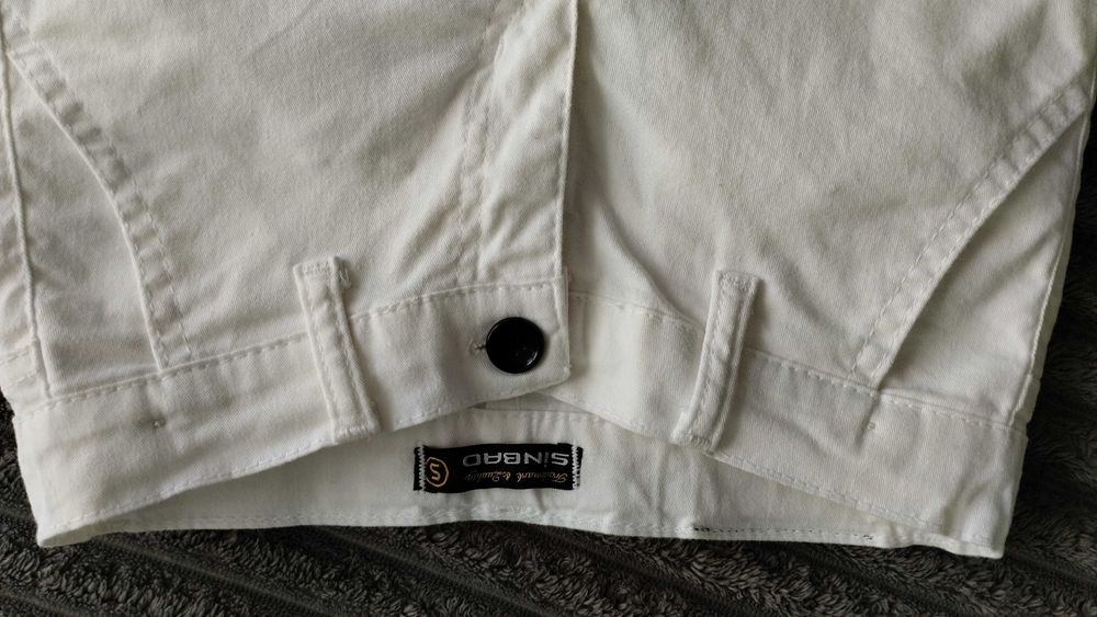 Білі штани на хлопчика 9-10 років