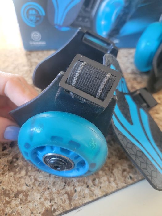 Роликовые коньки