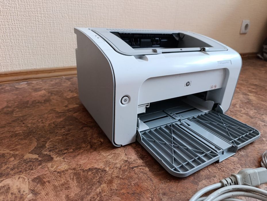 Принтер HP P1102