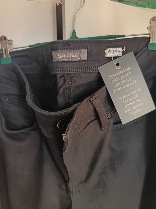 Calças de ganga como novas
