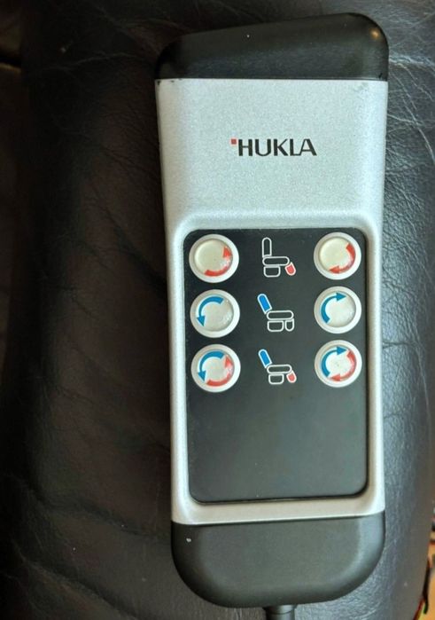 Шкіряне крісло реклайнер