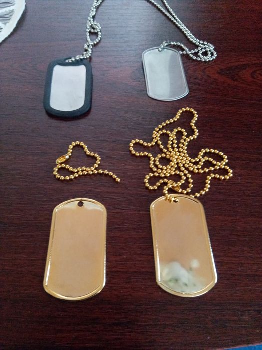 Жетони з нержавіючої сталі 50*27 мм з цепочками.
1 шт