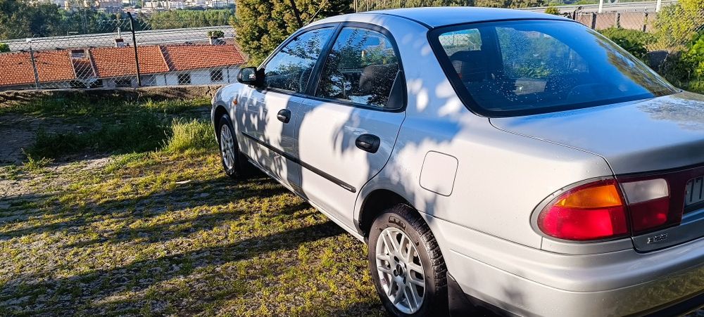 Mazda 323 pequeno problema no motor505918848972236803