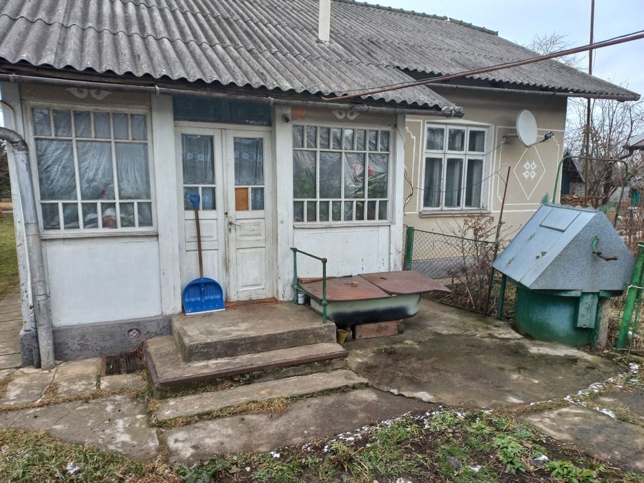 Будинок і земелна ділянка