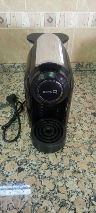 Máquina Café Delta Q a funcionar