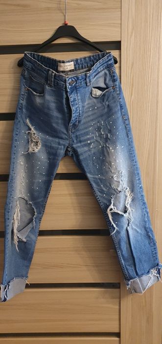 Spodnie jeans z rozdarciami