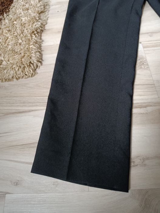 Eleganckie spodnie garniturowe nowe L