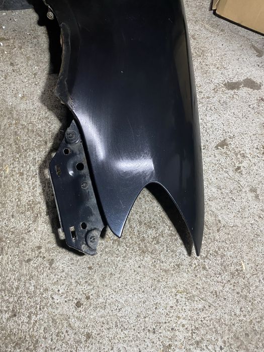 Błotnik przód prawy VW Touran lift 06-10r czarny