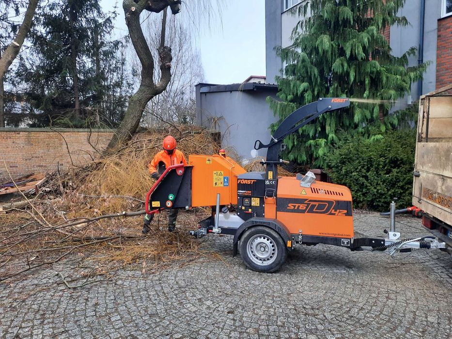 sprzątanie usuwanie rozdrabnianie gałęzi z działek rębakiem Łódź