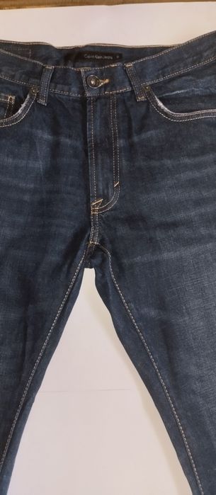 Джинси з потертостями