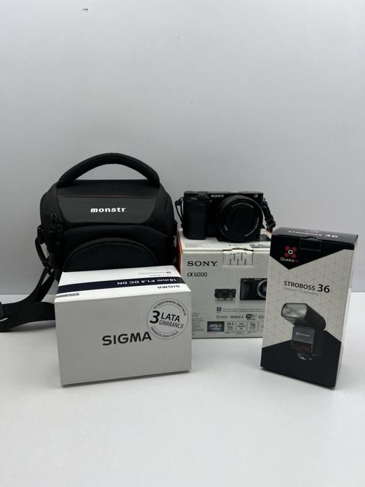 Aparat Sony Alpha 6000 + Obiektyw Sigma 16MM + Akcesoria/GW/Wys!