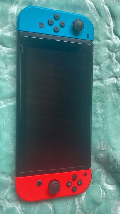 Nintendo Switch (como nova)