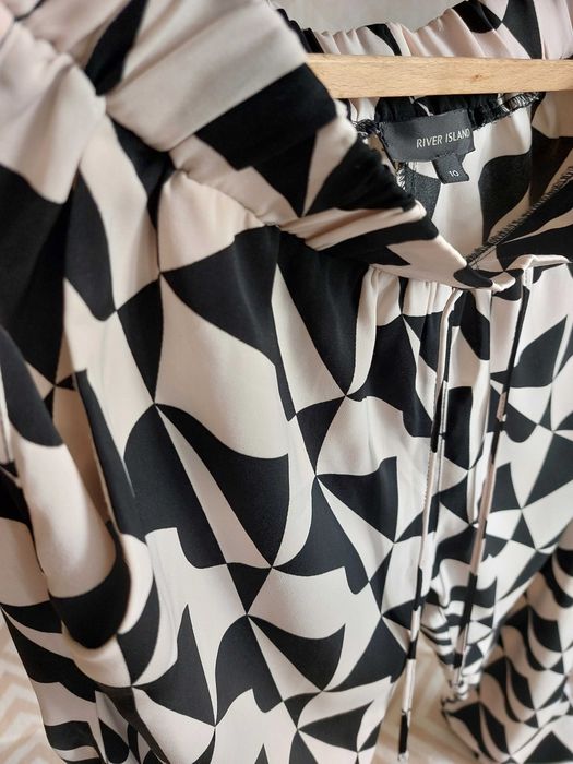 Wzorzyste spodnie River Island 38