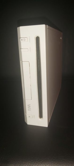 Nintendo Wii com comandos e jogos
