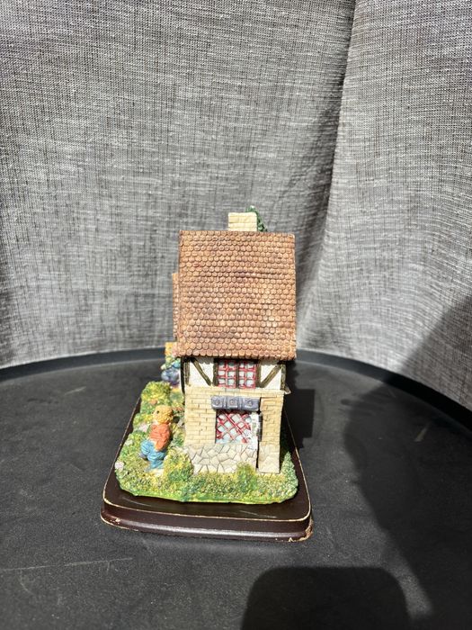 Mealheiro/Relógio em forma de casa