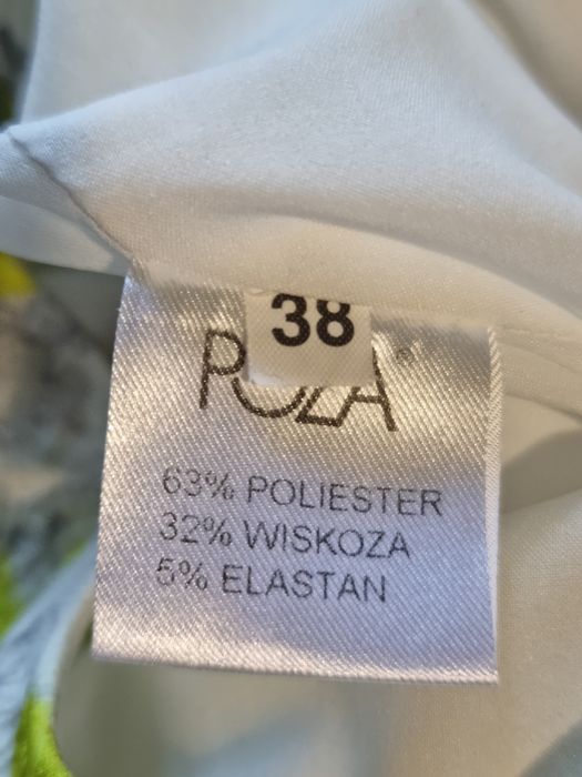 Elegancka biała sukienka midi we wzory M