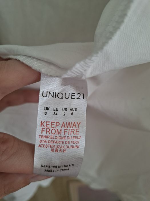 Elegancka biała koszula z szerokimi rekawami