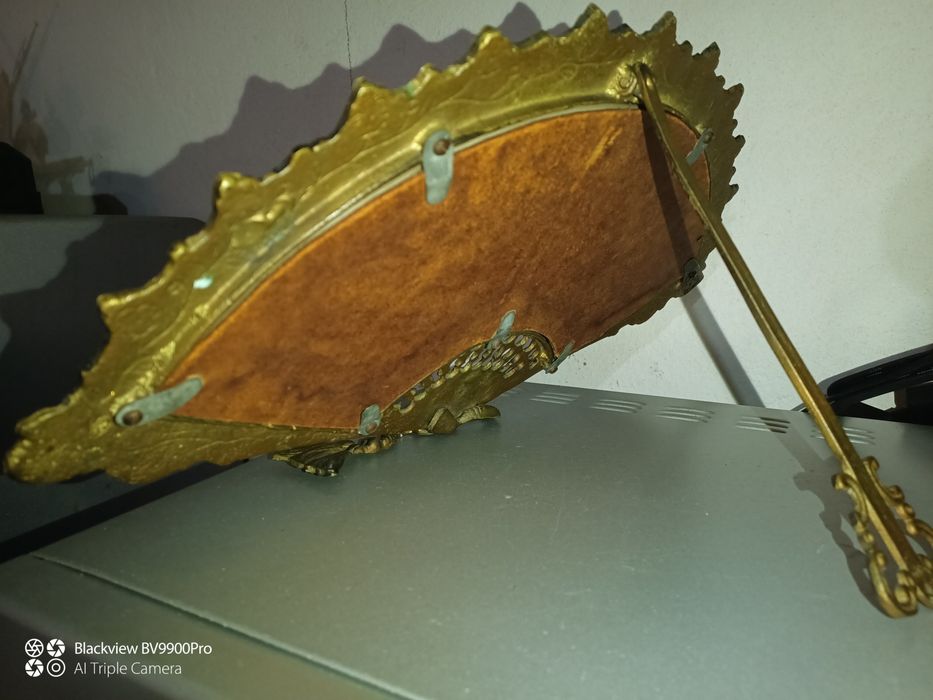 Espelho em latão mede largura 40cm altura  24cm