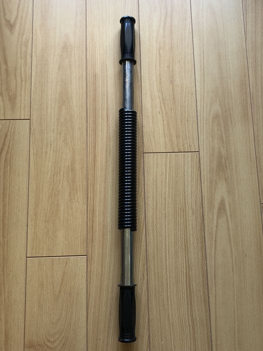 Barra de musculação flexível