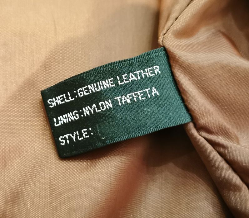 Skórzana kurtka z kapturem 140/146