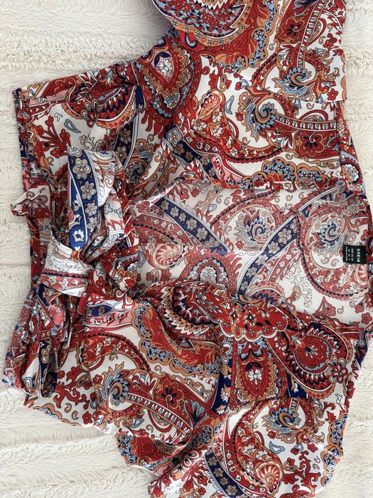 Blusa estampada tons vermelho