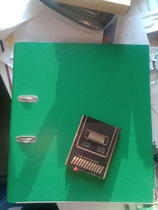 Segregator z koszulkami i notes z kalkulatorem