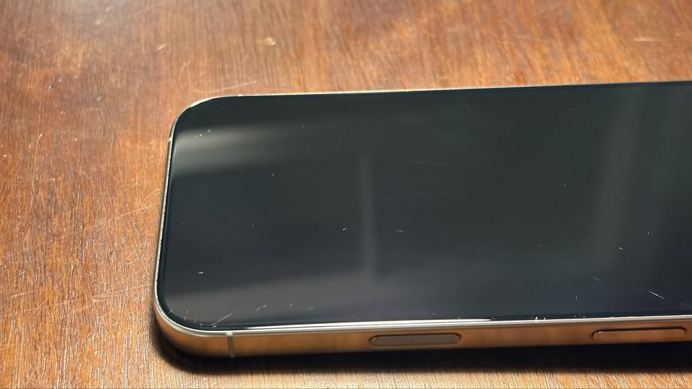 iPhone 16 Pro 128GB Titanium – Used, Minor Screen Scratches