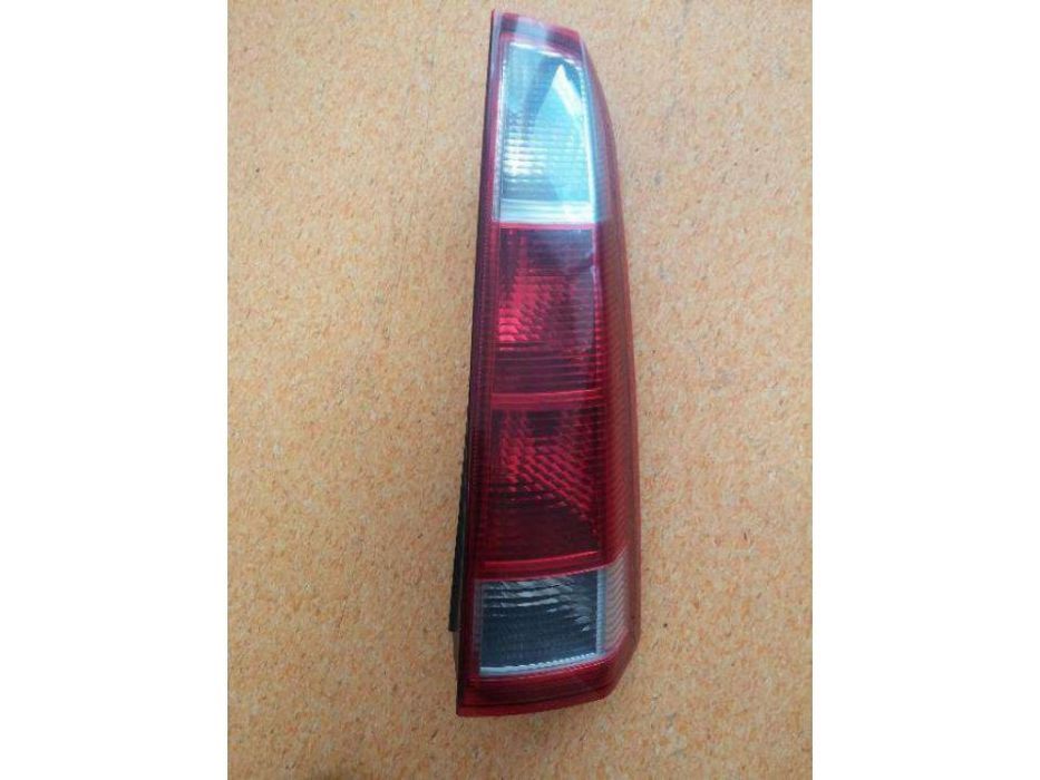 Farolim farol tras direito opel meriva