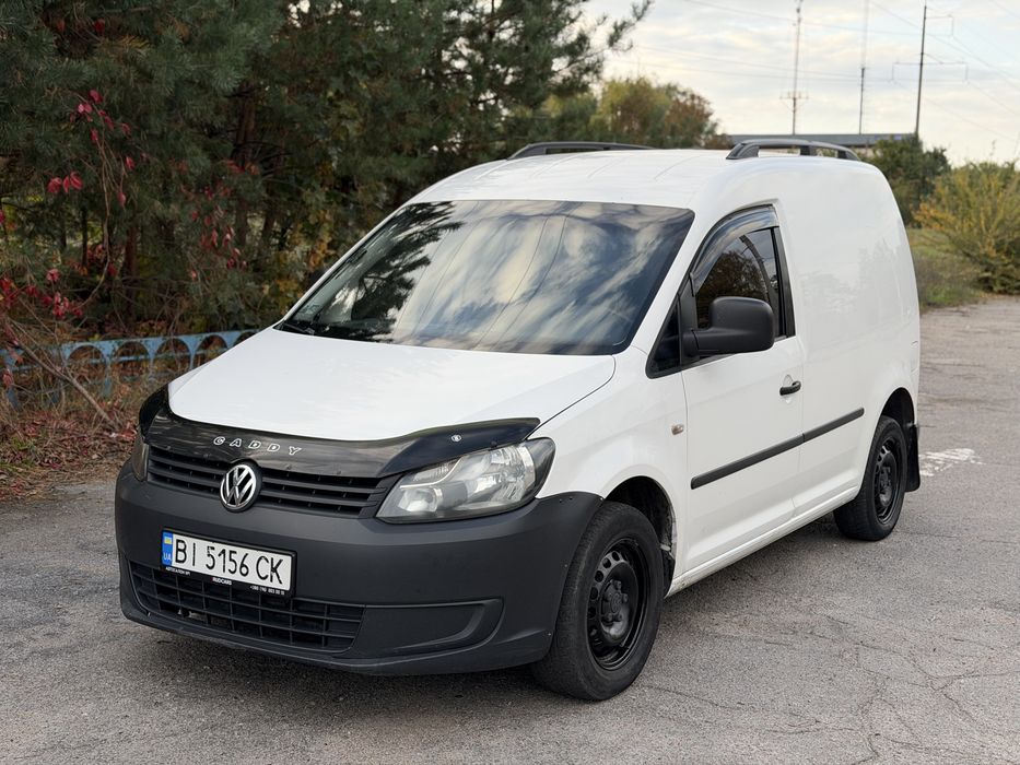 Volkswagen Caddy 2012 год.Не бит,не крашен .