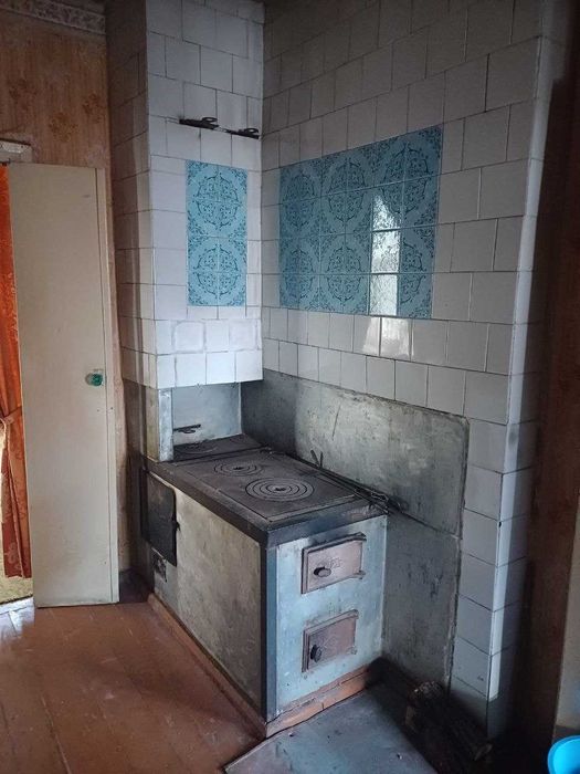 Продам 1/2 будинка в м.Богодухові