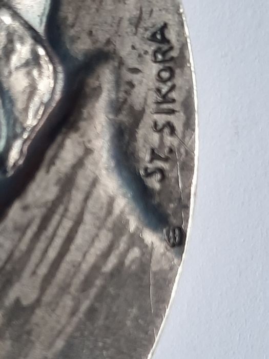 2 medale sygnowane.