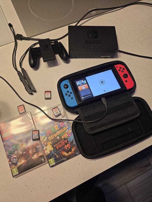 Konsola Nintendo Switch dodatki + 4gry
