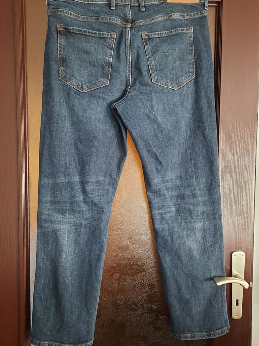 Jeansy męskie River Island