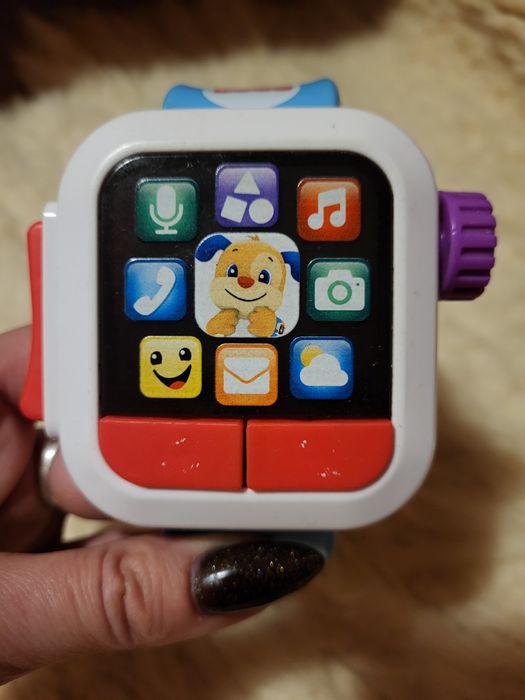 Zegarek i piesek do ciągnięcia fisher price.