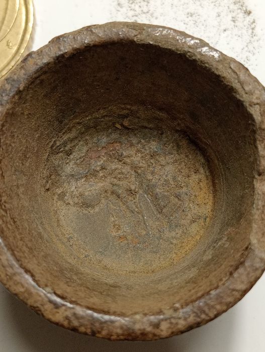 Peça antiga em metal