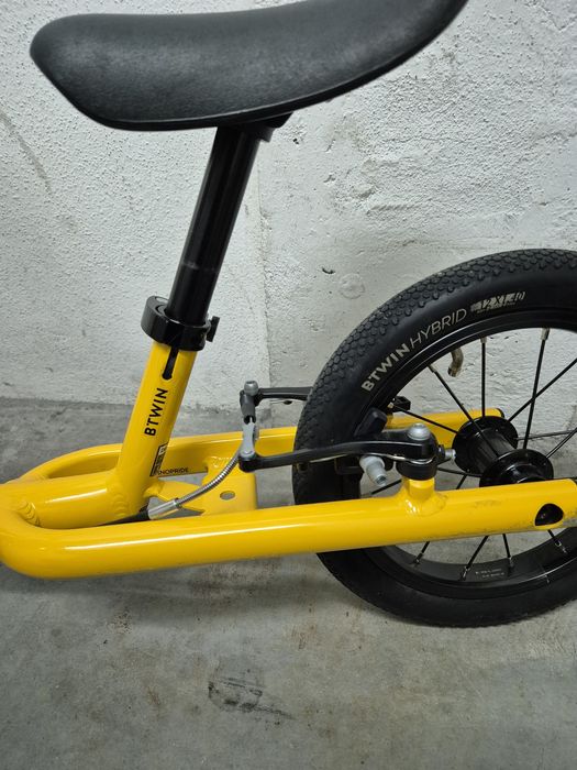 Bicicleta de aprendizagem criança amarelo BTWIN