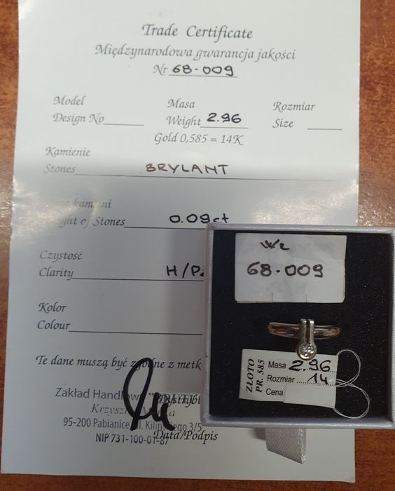 Złoty pierścionek z brylantem 14 karat
