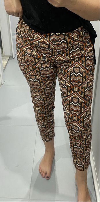 Wzorzyste spodnie H&M aztecki wzór brąz pomarańcz 42 xl jak nowe