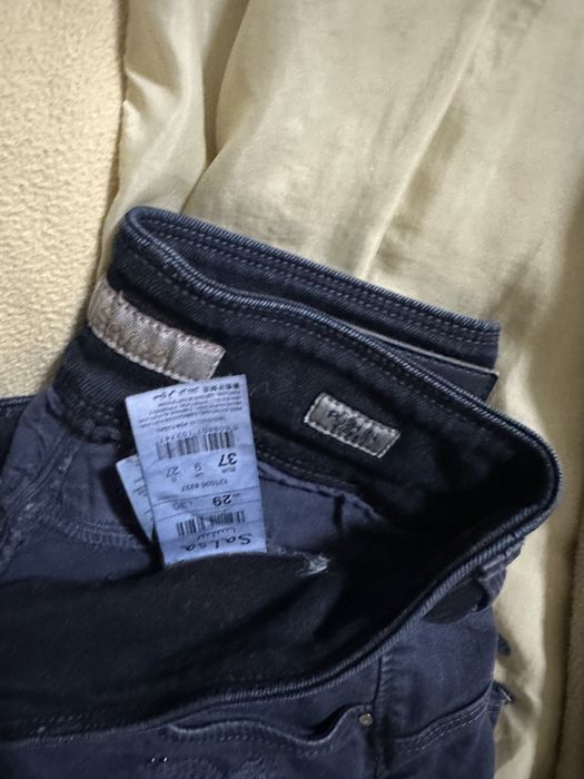 Roupa tamanho entre S e M