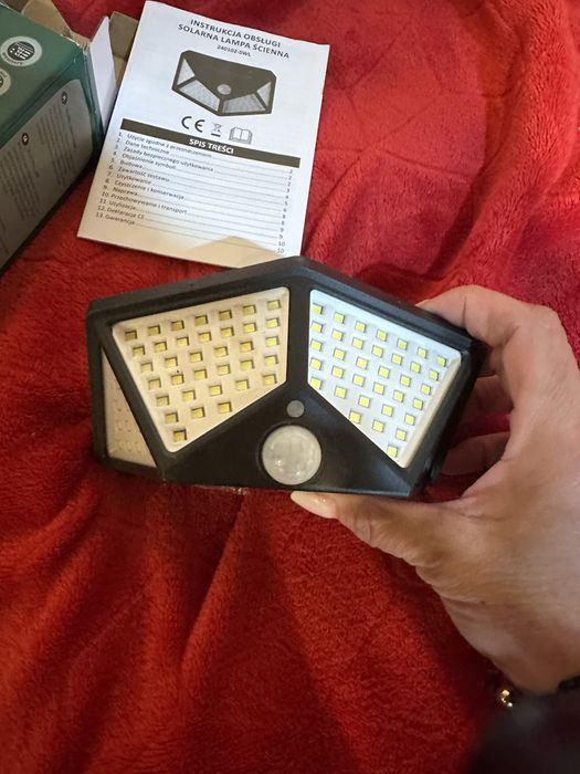 Solarna lampa ścienna LED 100 diod + czujnik ruchu IP44 nowa