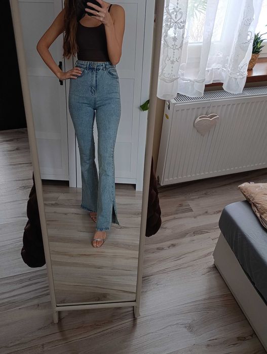 Spodnie jeansowe wysoki stan dzwony rozcięcia spodnie jeansowe