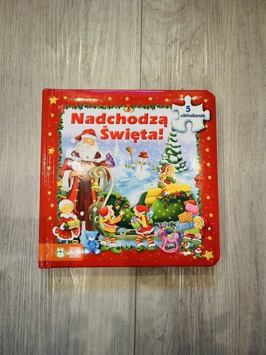 Nadchodzą Święta książka z puzzlami stan bardzo dobry