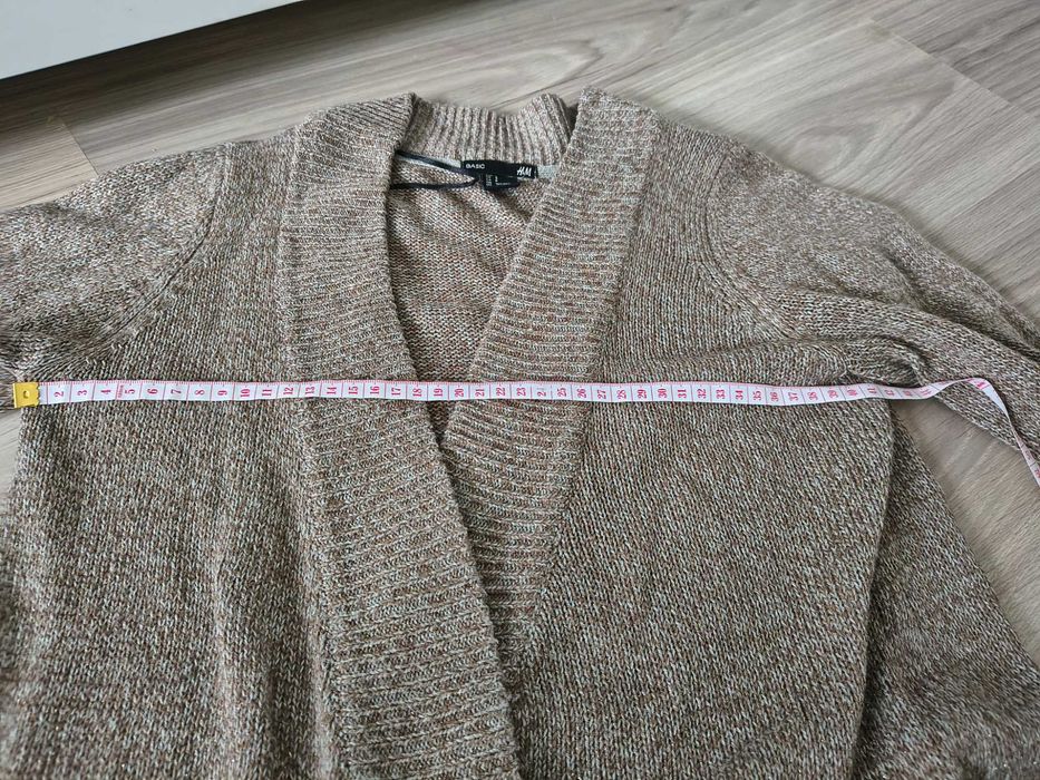 Długi sweter kardigan z kieszeniami ze złota nitka H&M s 36