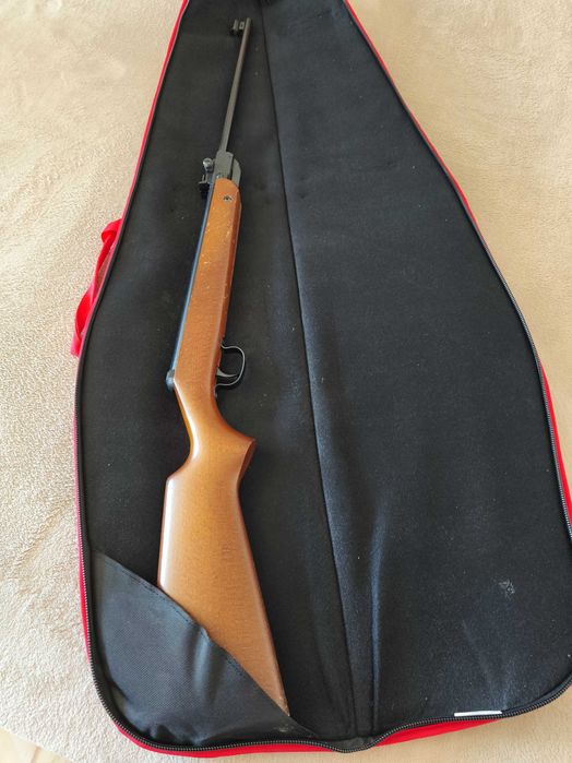 Arma de pressão com saco.