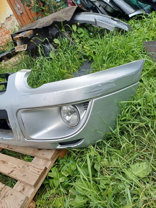 Subaru Impreza 03-05 рік передній бампер бампера 57704FE080