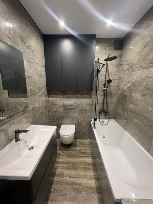 Укладка  керамограніту,декоративні роботи,малярні роботи